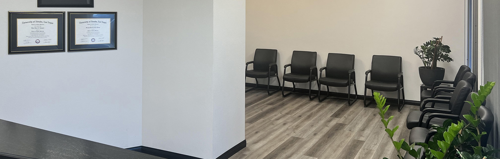 The image shows a modern dental clinic interior with various pieces of equipment, including a dental chair and an X-ray machine.